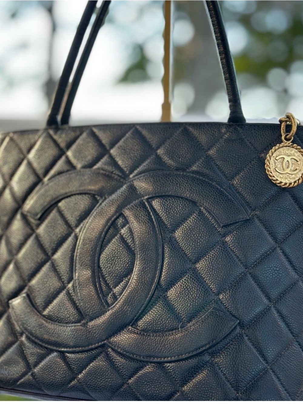 Authentic- CHANEL Black Quilted Caviar Medallion Tote with Gold Medallion